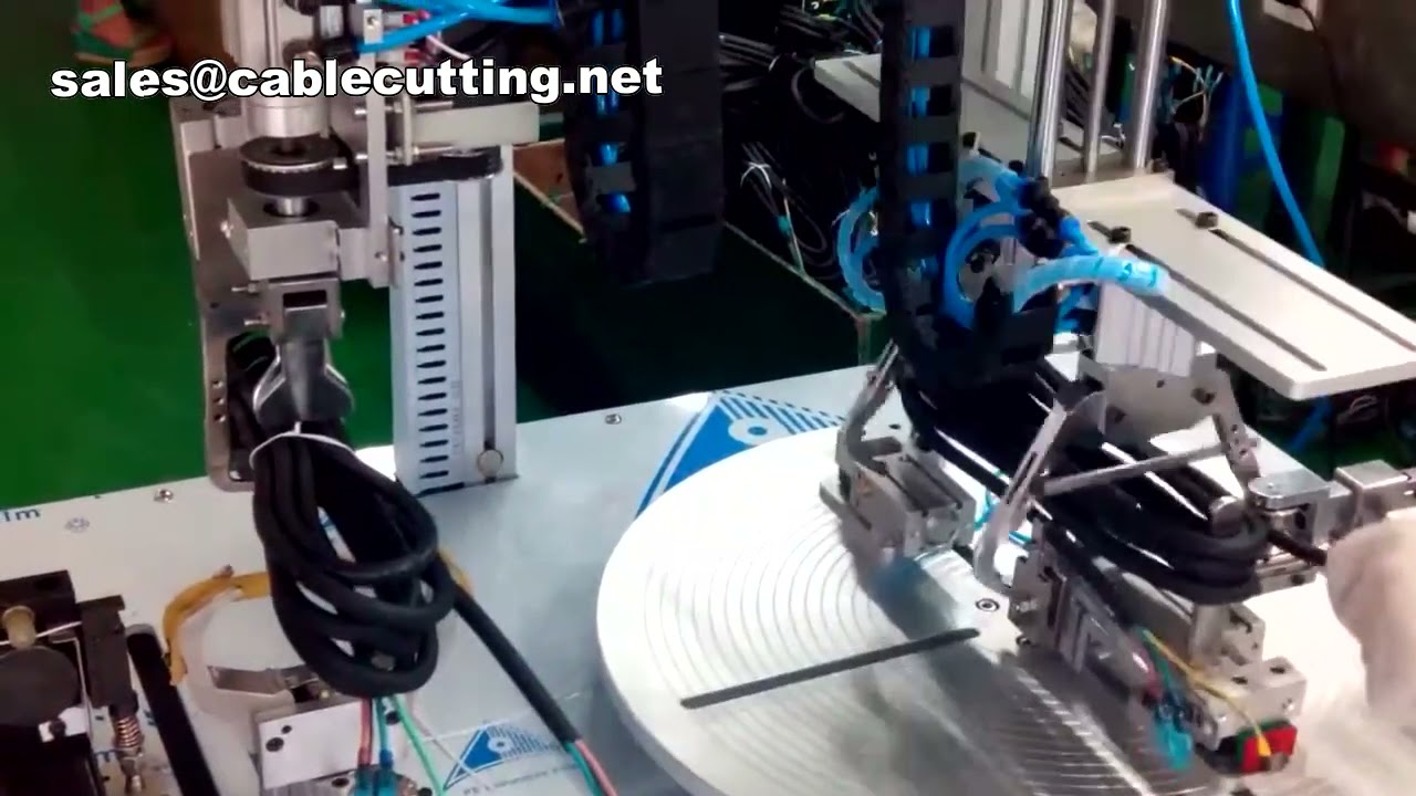 Machine d'enroulement et de ligature automatique de câbles et fils