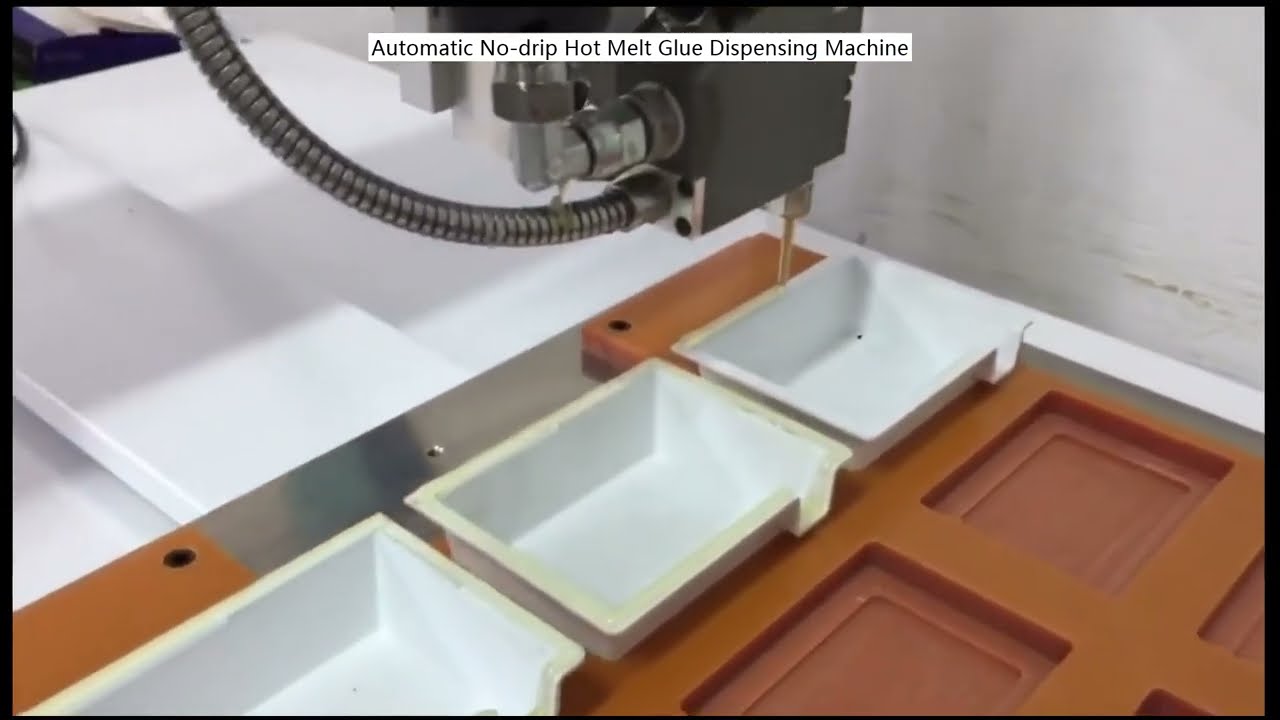 Distributeur automatique de colle thermofusible anti-goutte